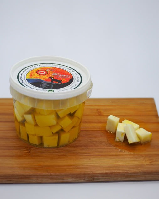Dados de queso de cabra semicurado en aceite de oliva - El Palancar